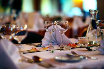 This table is ready to go with the place settings in just the right places.