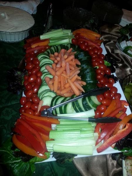 Indulge in a light and refreshing snack from our colorful veggie tray! 