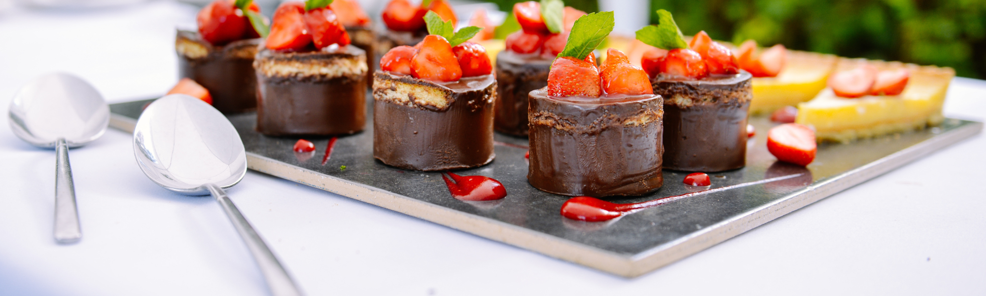 delicious chocolate mousse desserts on a tray 